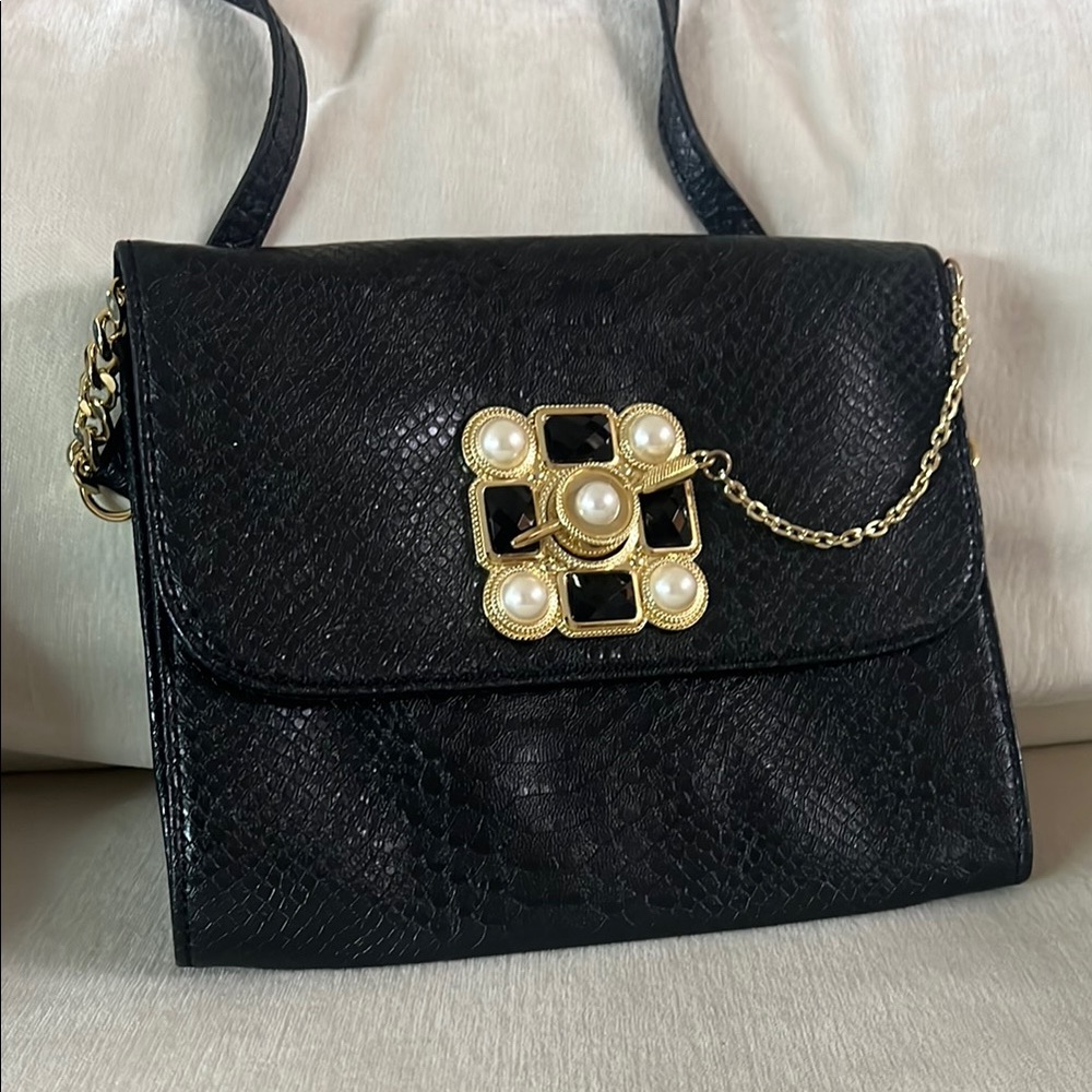 Elegant Black Handbag with Gold Accents
